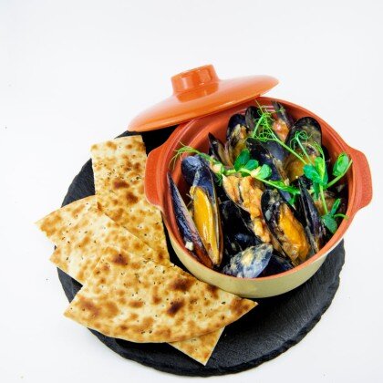 Мидии в створках в сливочно-винном соусе