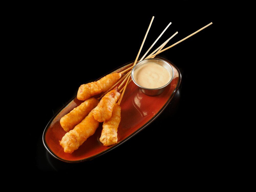 Креветули, затюненные кляром,
с соусом кимчи